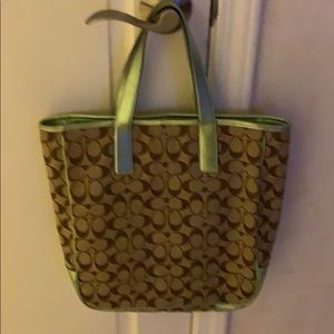 Coach purse with metallic green detail tote